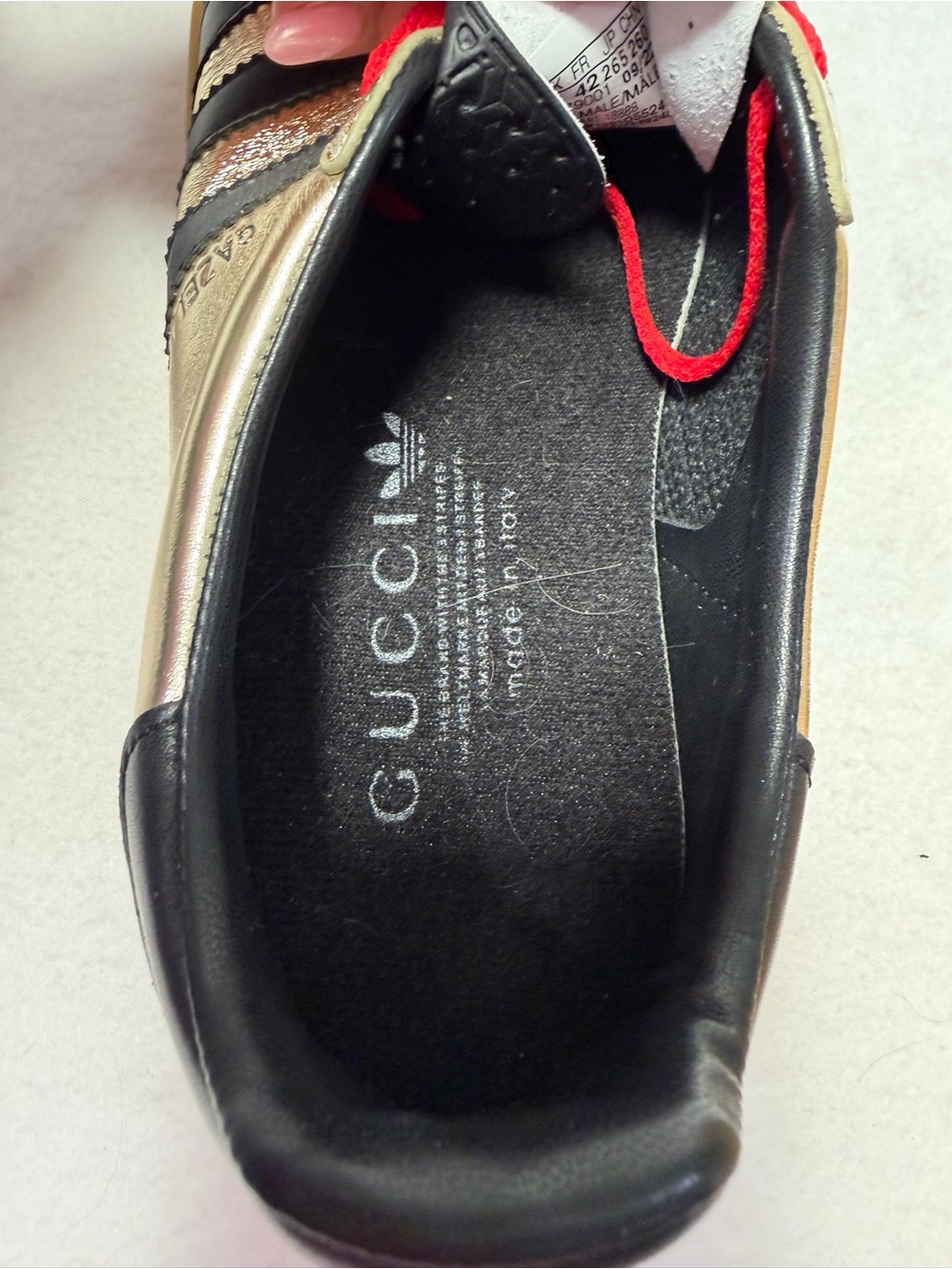 Gucci Metallic Gold Sneakers with Black Stripes and Red Laces - Picture 7 of 8